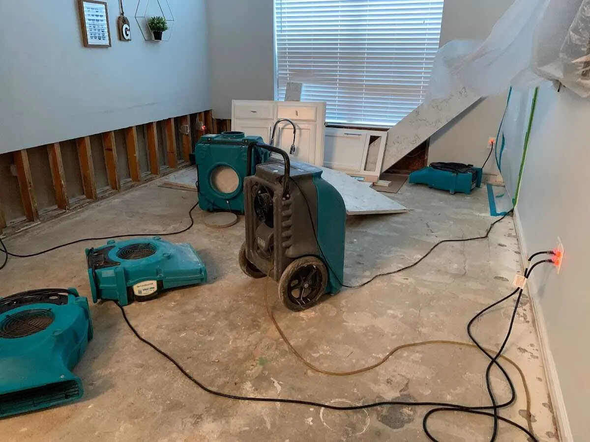 Dehumidifier in flood-cut room for Water Damage Restoration in Sweden